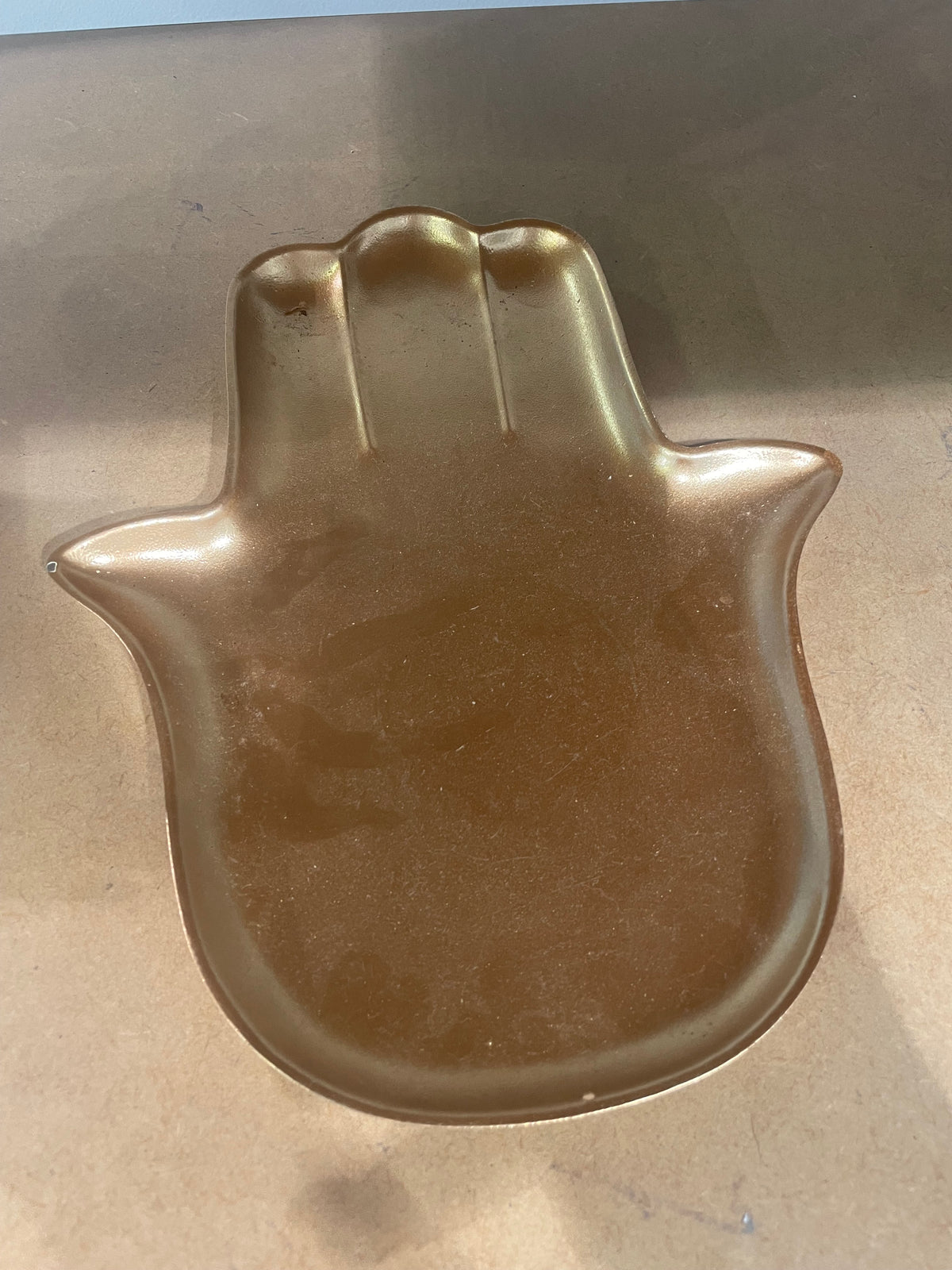 Rooskleurig hand